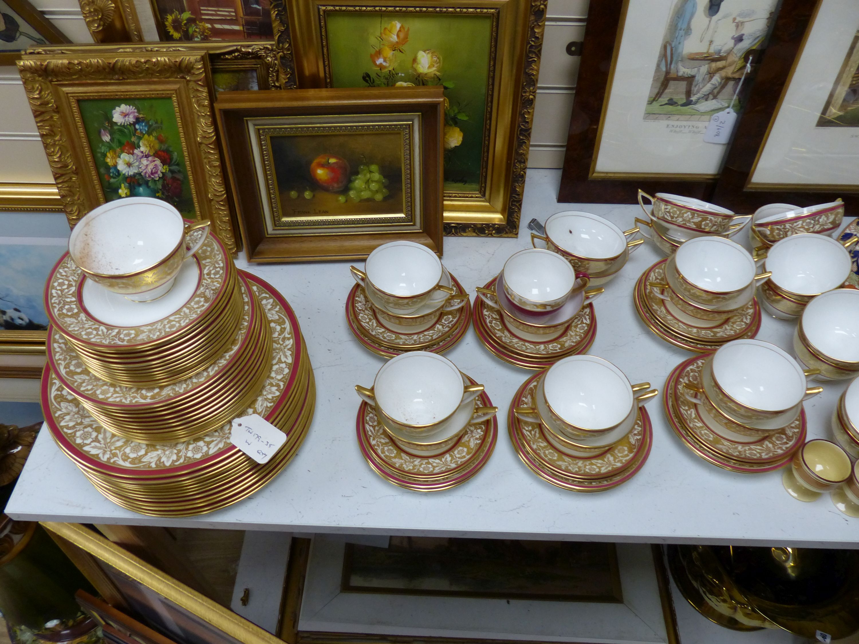 A Mintons breakfast set, a Minton part dinner service and a Woods floral-patterned part dinner service